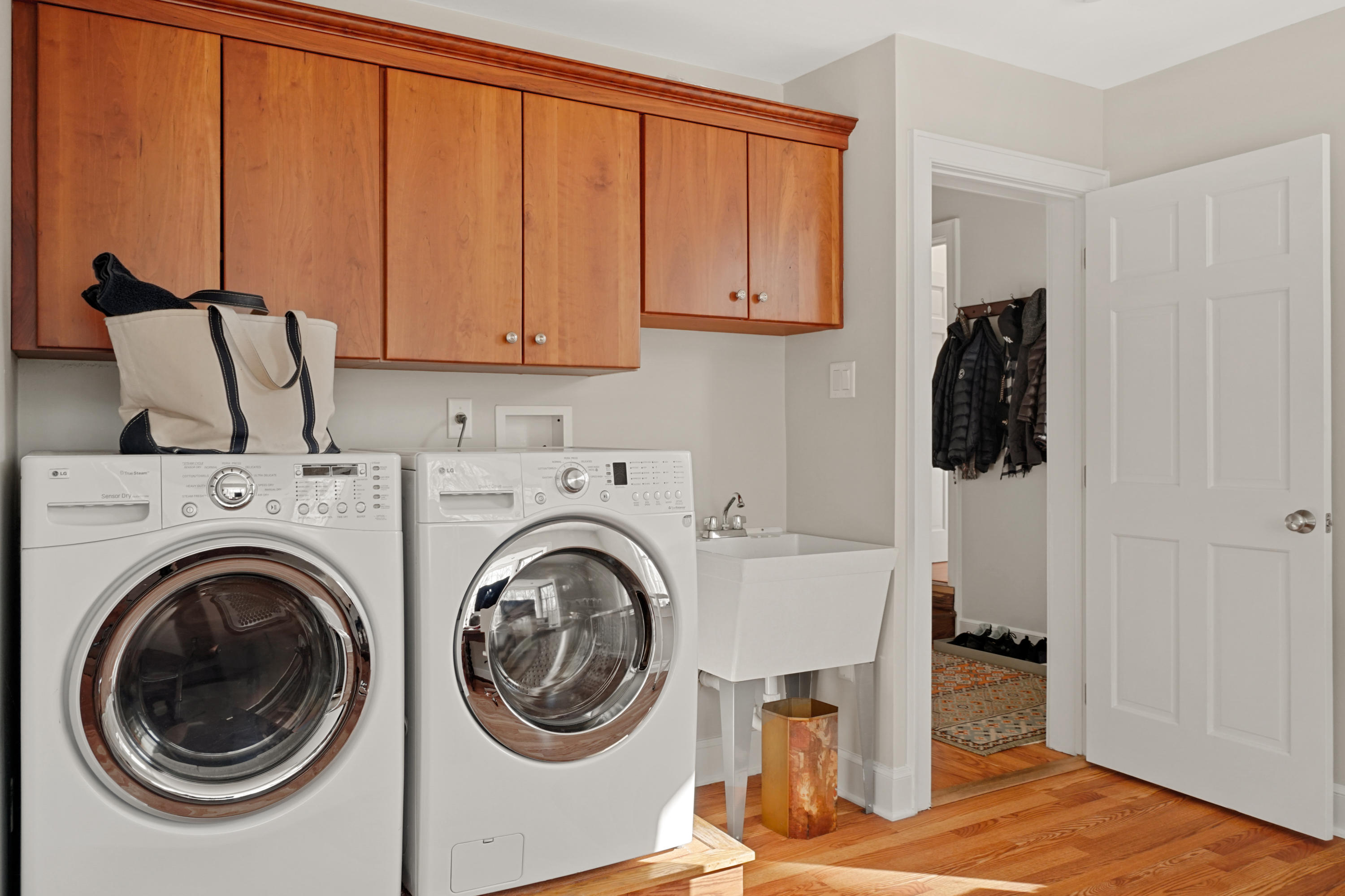 102 Ludlowe Road New Canaan, CT 06840 - Photo 34 of 42 a view of hallway with washer and dryer