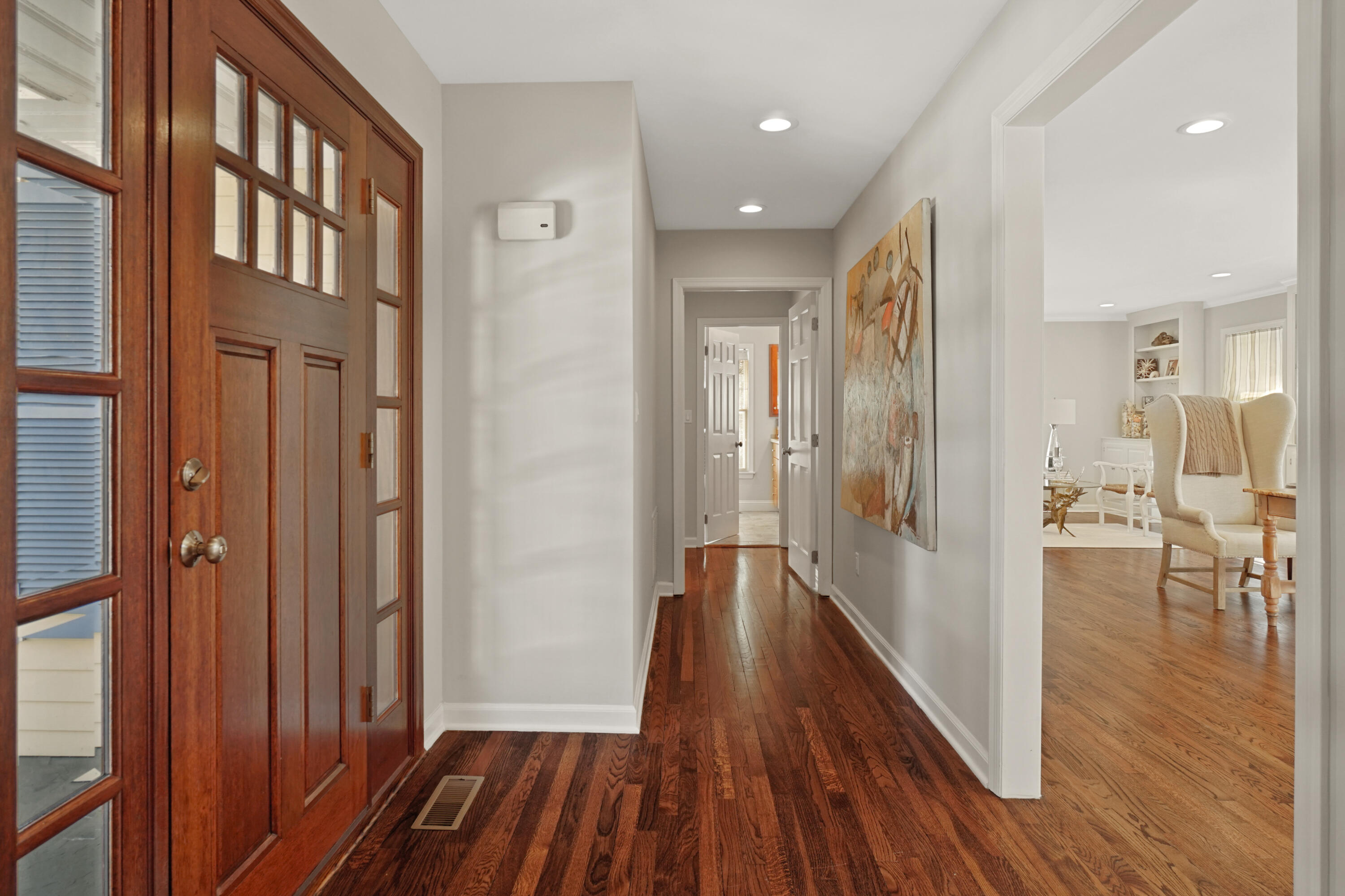 102 Ludlowe Road New Canaan, CT 06840 - Photo 6 of 42 a view of a hallway with wooden floor