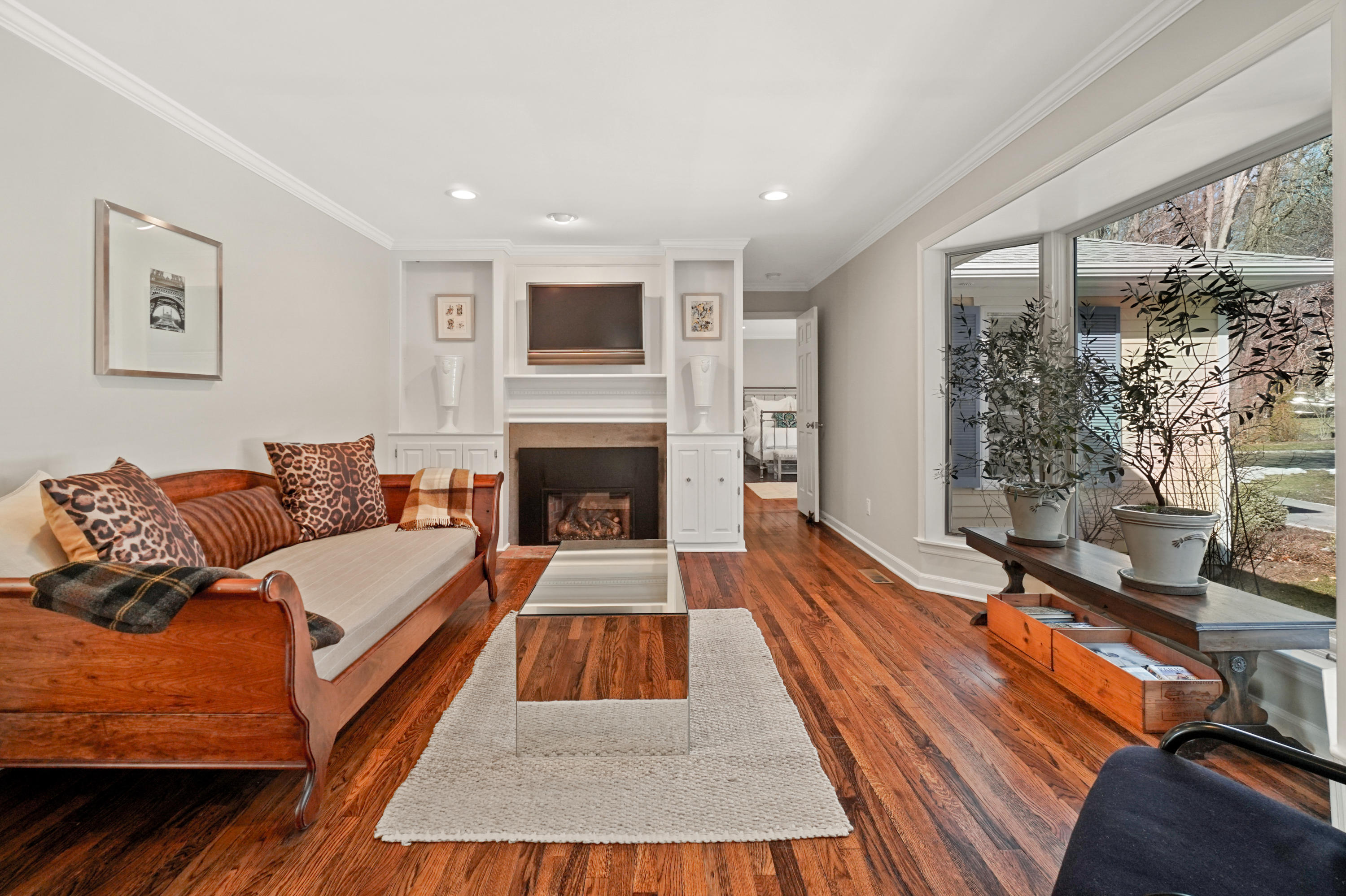 102 Ludlowe Road New Canaan, CT 06840 - Photo 8 of 42 a living room with furniture and a fireplace