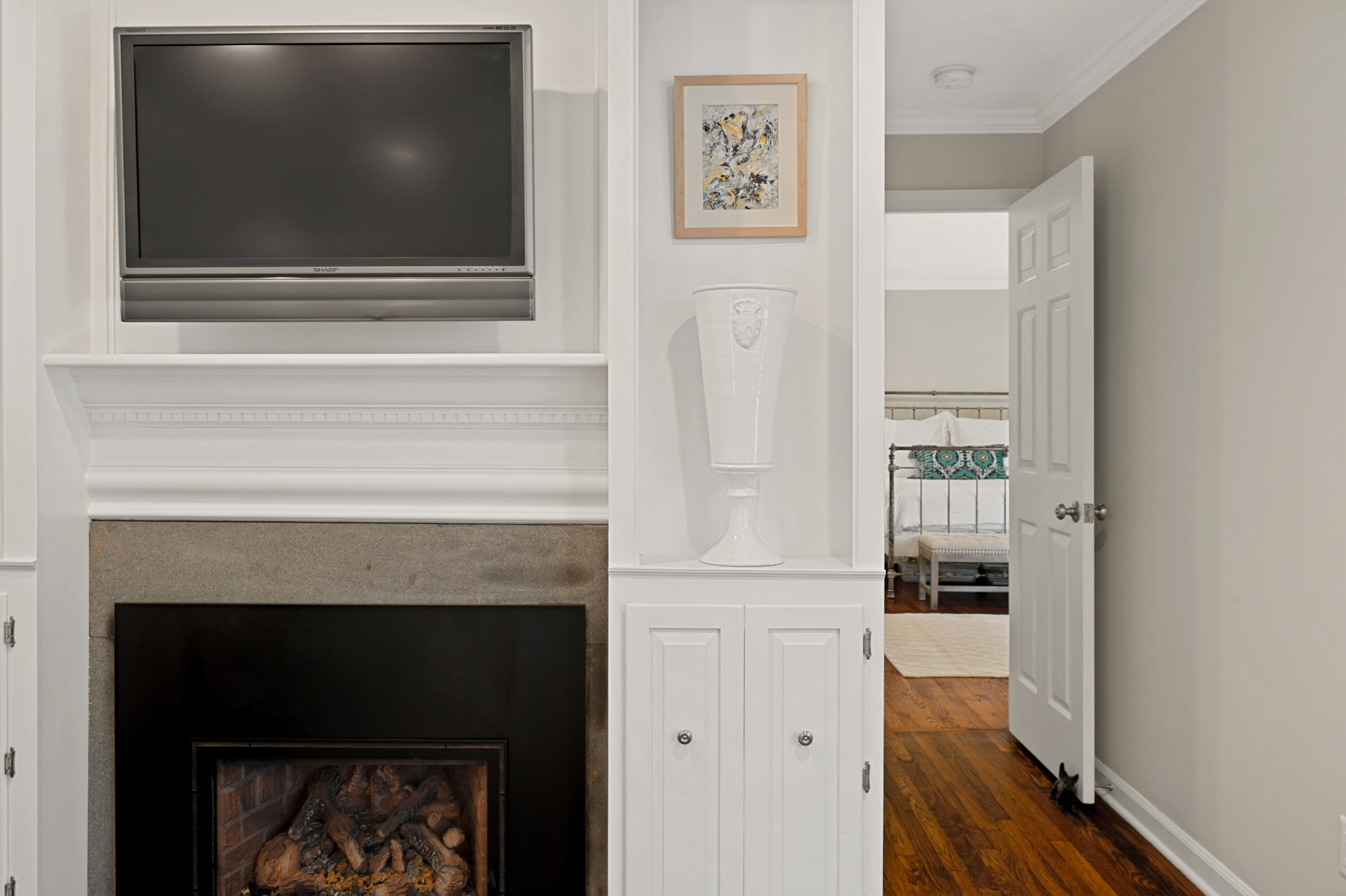 102 Ludlowe Road New Canaan, CT 06840 - Photo 9 of 42 a living room with a fireplace