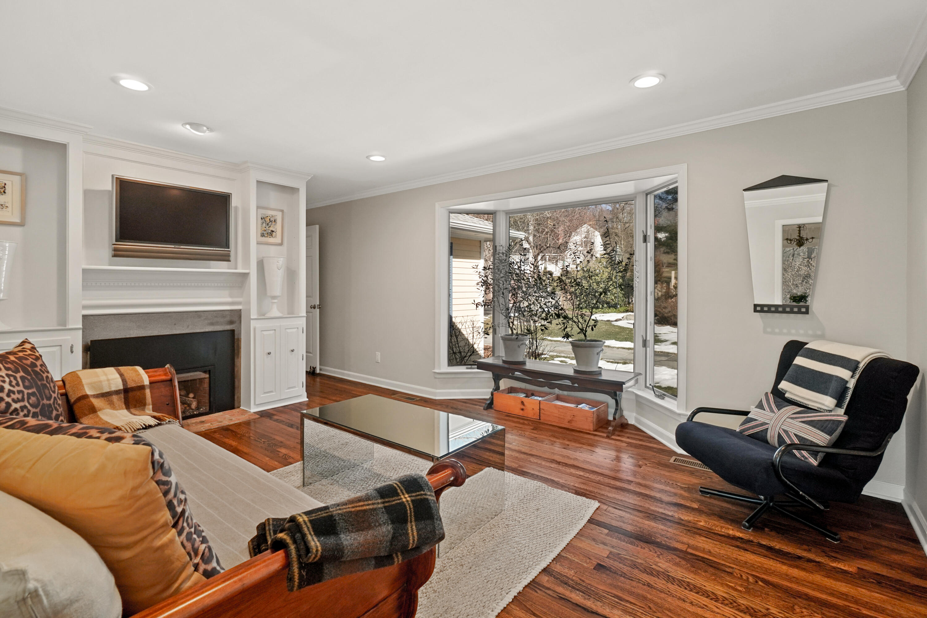 102 Ludlowe Road New Canaan, CT 06840 - Photo 10 of 42 a living room with furniture fireplace and flat screen tv