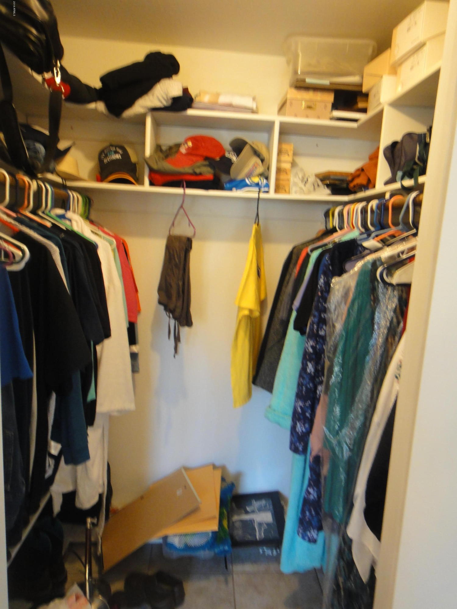 3028 East Bloomfield Road Phoenix, AZ 85032 - Photo 54 of 60 a view of walk in closet with clothes and shoes