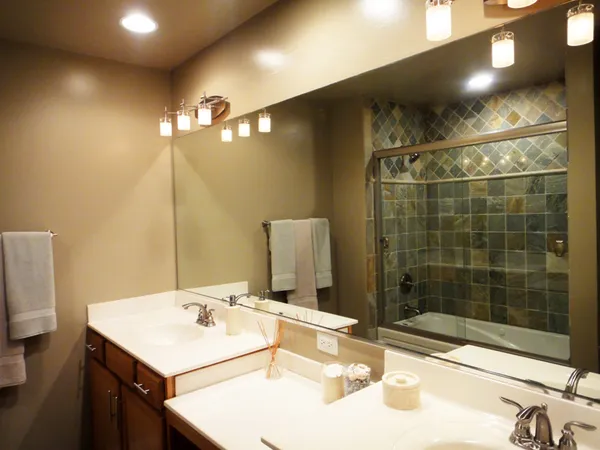 a bathroom with a sink and a mirror