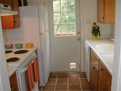 105 Ridge Road San Anselmo, CA 94960 - Photo 8 of 12 New kitchen counters, cast iron kitchen sink, and Moen faucets.