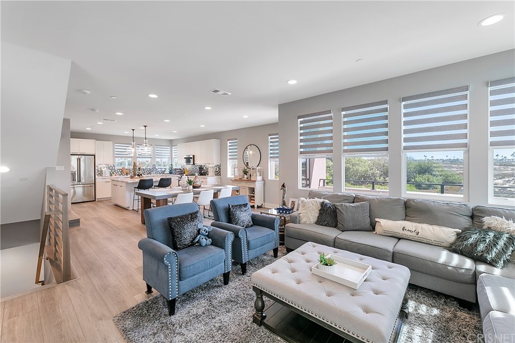 1051 Canal Street Oxnard, CA 93035 - Photo 11 of 37 a living room with furniture and a large window