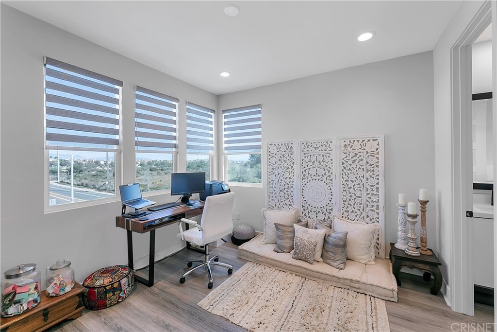 1051 Canal Street Oxnard, CA 93035 - Photo 25 of 37 a workspace with furniture and a window