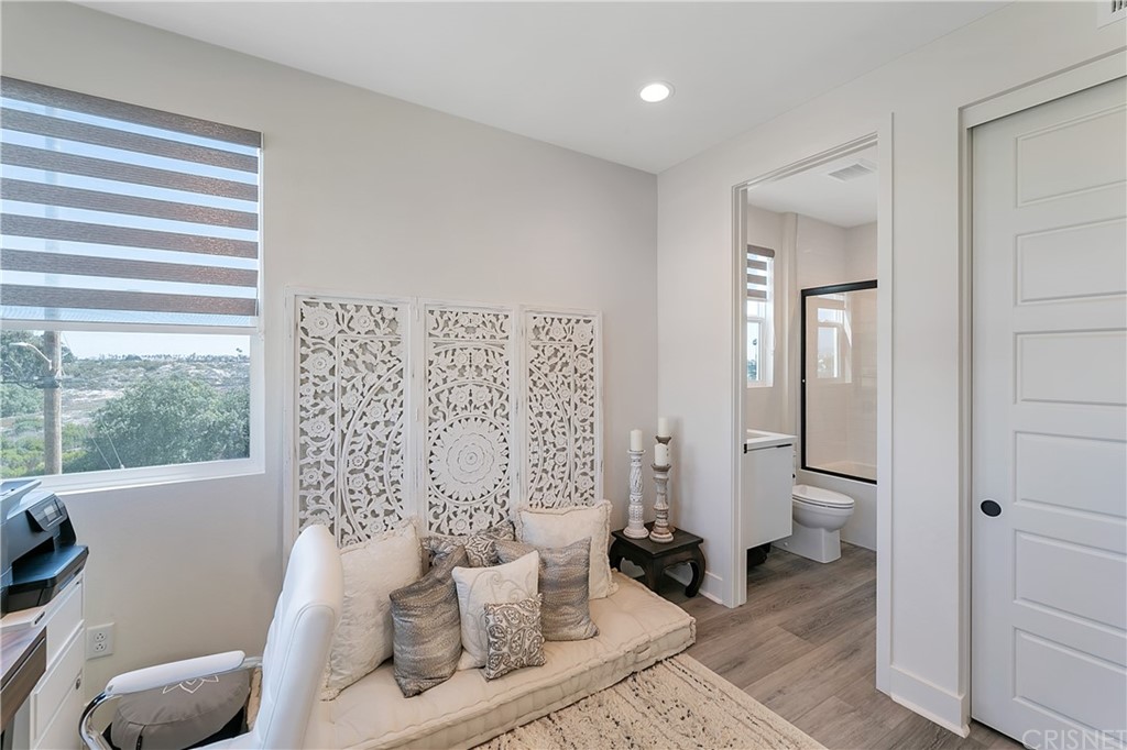 1051 Canal Street Oxnard, CA 93035 - Photo 26 of 37 a living room with furniture and a window