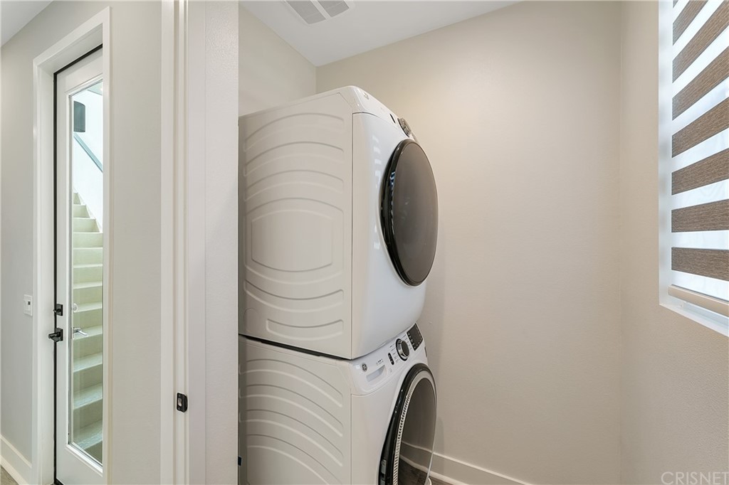 1051 Canal Street Oxnard, CA 93035 - Photo 28 of 37 a close up view of a bathroom with a sink and a window