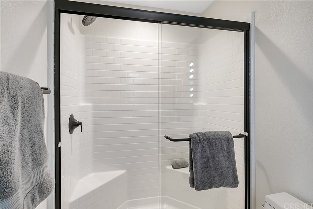 1051 Canal Street Oxnard, CA 93035 - Photo 34 of 37 a bathroom with a shower