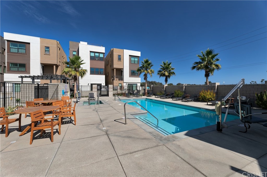 1051 Canal Street Oxnard, CA 93035 - Photo 35 of 37 a living room with patio furniture and a potted plant