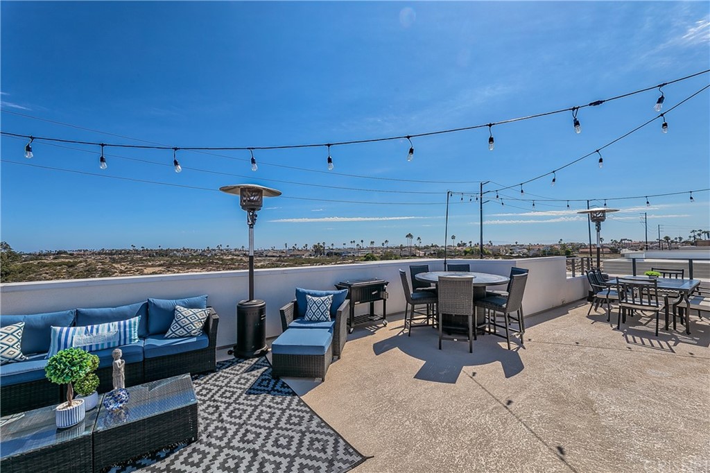 1051 Canal Street Oxnard, CA 93035 - Photo 5 of 37 a view of a terrace with furniture and outdoor view