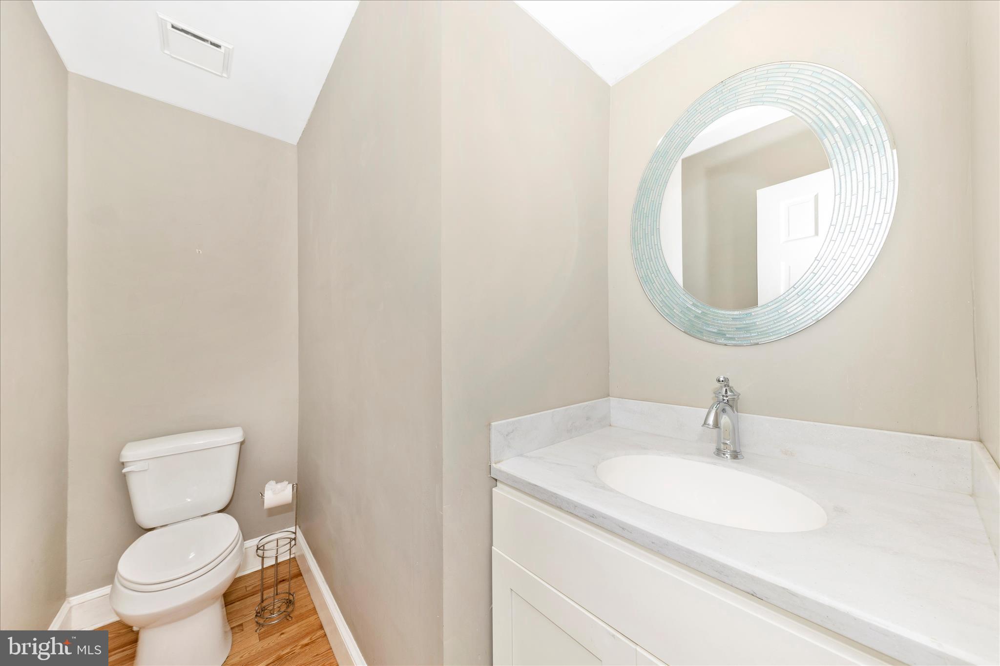 29 East 7th Street Frederick, MD 21701 - Photo 17 of 53 a bathroom with a sink and a mirror