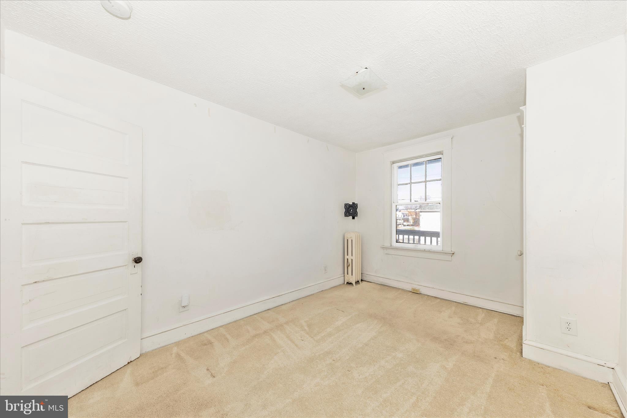 29 East 7th Street Frederick, MD 21701 - Photo 24 of 53 an empty room with windows
