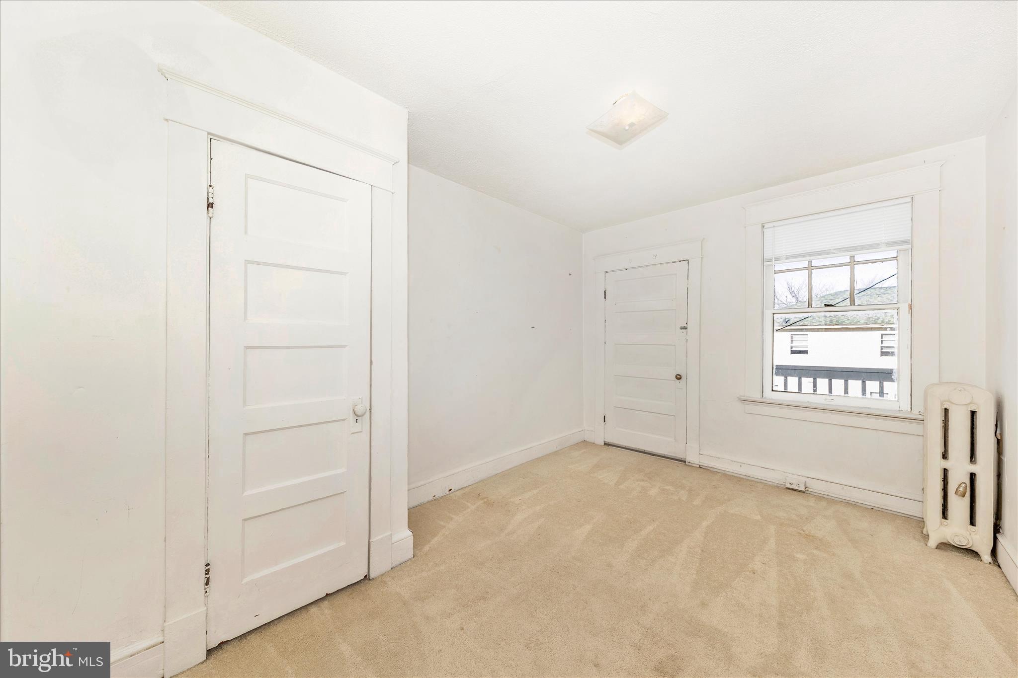 29 East 7th Street Frederick, MD 21701 - Photo 27 of 53 an empty room with windows