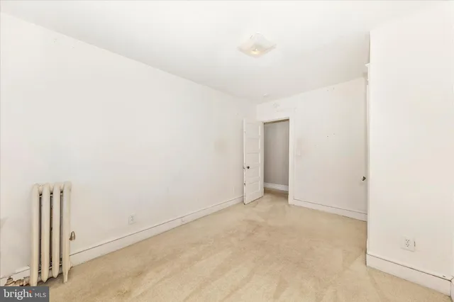 an empty room with an entryway