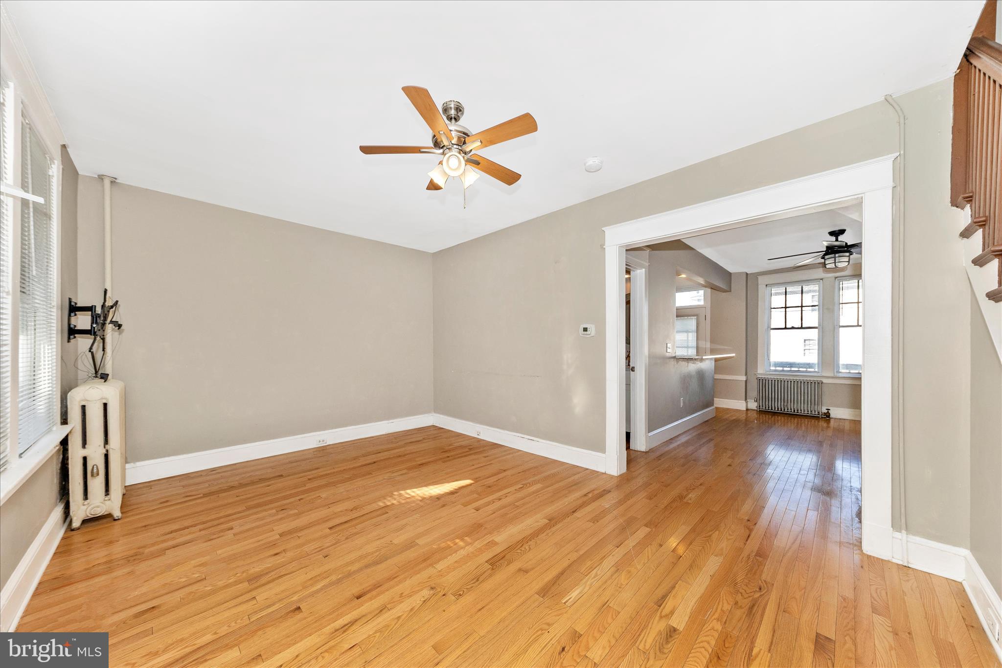 29 East 7th Street Frederick, MD 21701 - Photo 3 of 53 a view of empty room with wooden floor and fan