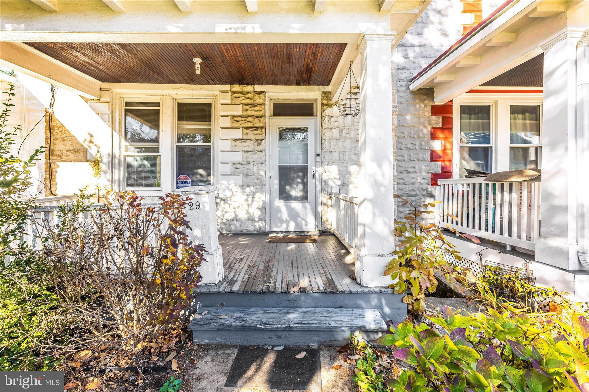 29 East 7th Street Frederick, MD 21701 - Photo 39 of 53 a view of a porch with a table and chairs