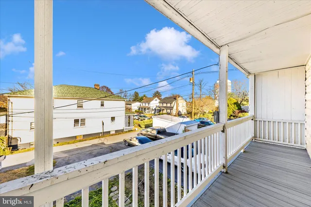a view of a balcony with many windows