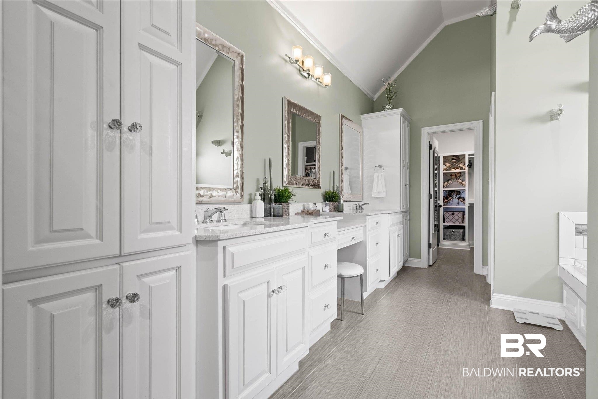 24908 Bosbyshell Avenue Daphne, AL 36526 - Photo 8 of 49 Bathroom featuring dual vanities with white cabinetry, integrated sinks, and individual mirrors