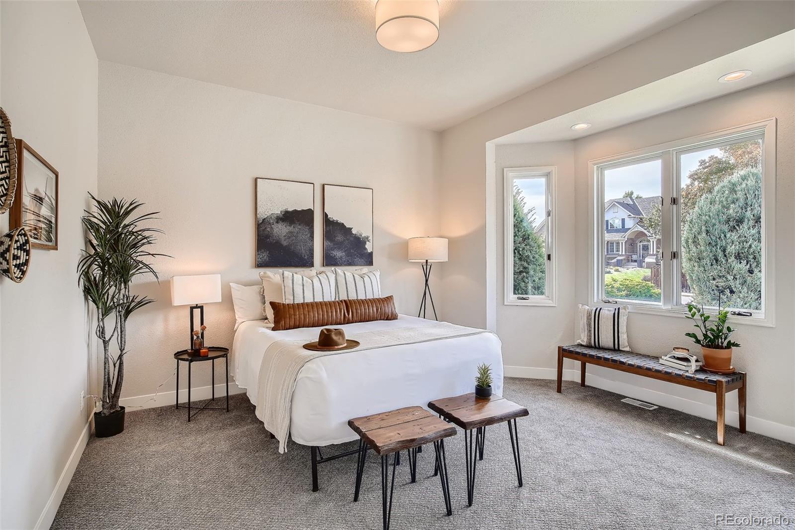 3806 Simms Court Wheat Ridge, CO 80033 - Photo 17 of 30 a bed room with a bed and a window