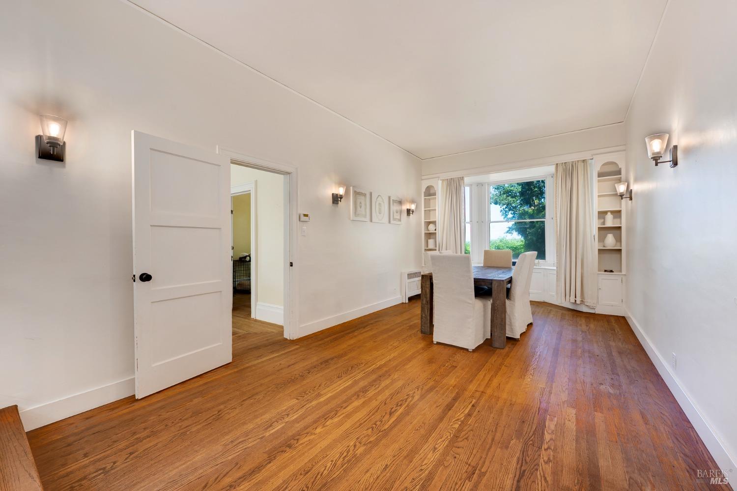 125 Cristo Lane Santa Rosa, CA 95409 - Photo 13 of 82 wooden floor in an empty room with a window