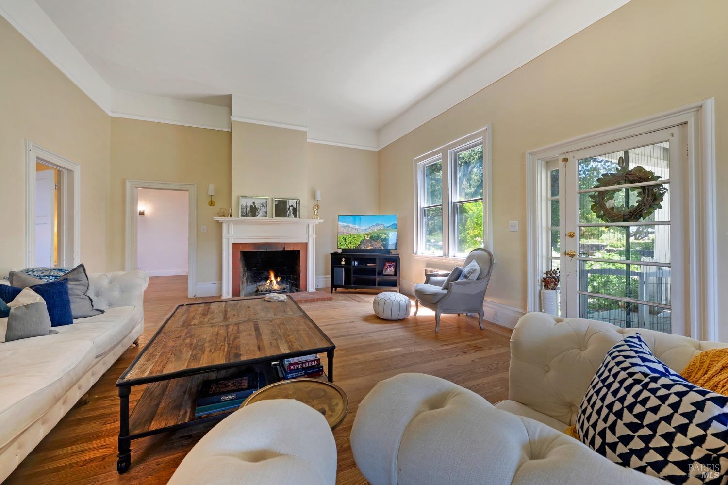 125 Cristo Lane Santa Rosa, CA 95409 - Photo 17 of 82 a living room with furniture and a fireplace