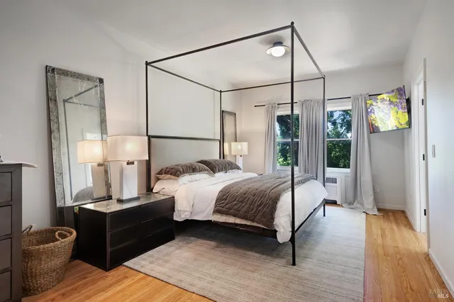 a view of a patio with a table chairs and backyard