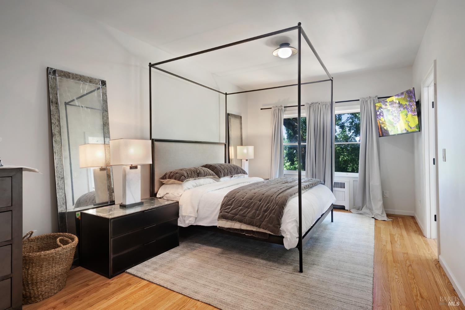 125 Cristo Lane Santa Rosa, CA 95409 - Photo 20 of 82 a bedroom with a bed and wooden floor