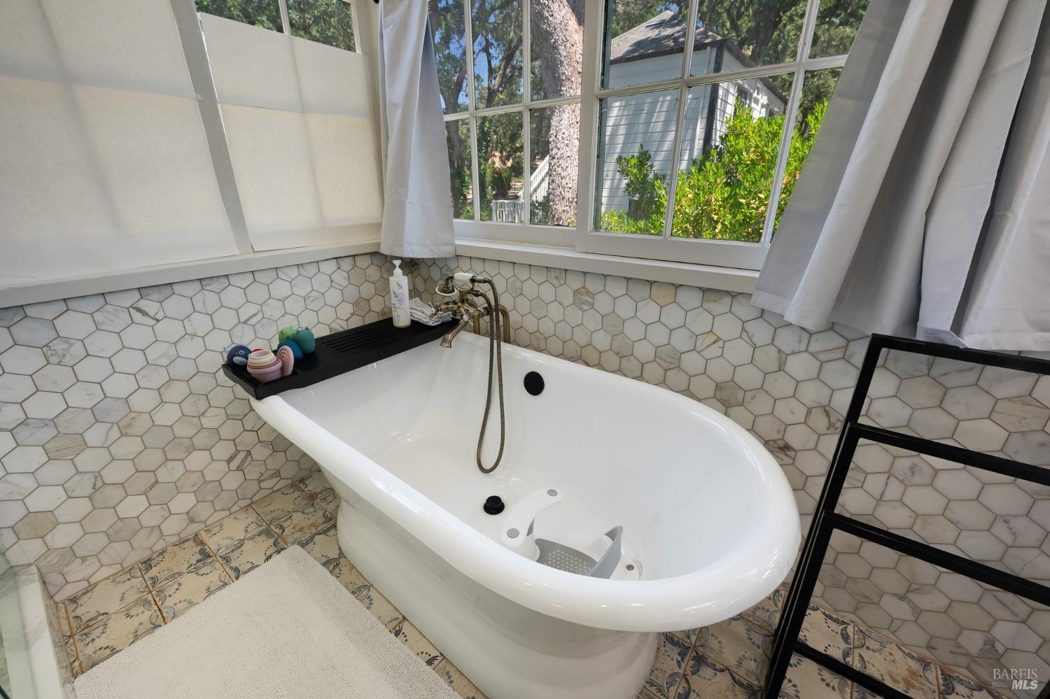 125 Cristo Lane Santa Rosa, CA 95409 - Photo 23 of 82 a white bath tub sitting in a bathroom sink