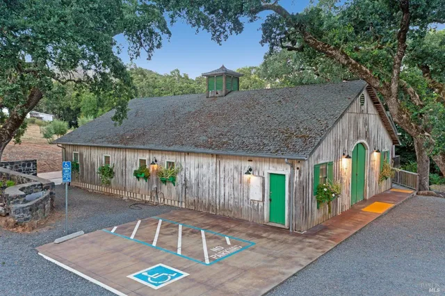 a bathroom with a toilet and shower