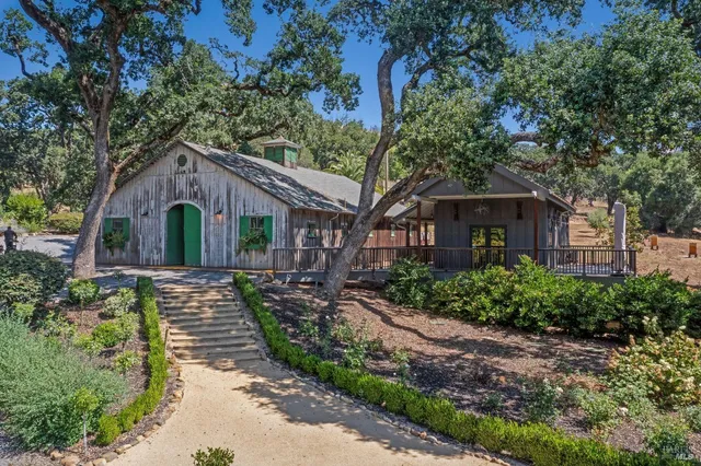 a view of a house with swimming pool