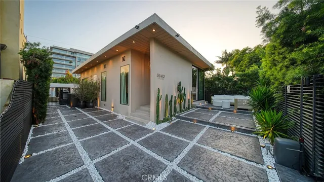 a view of a porch with seating space