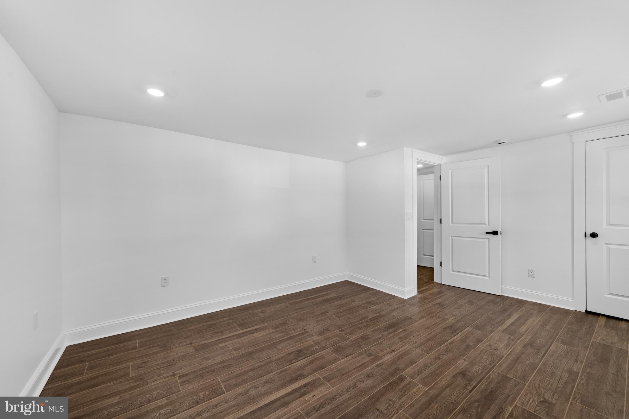 15 West Main Street Marlton, NJ 08053 - Photo 22 of 38 a view of an empty room with wooden floor