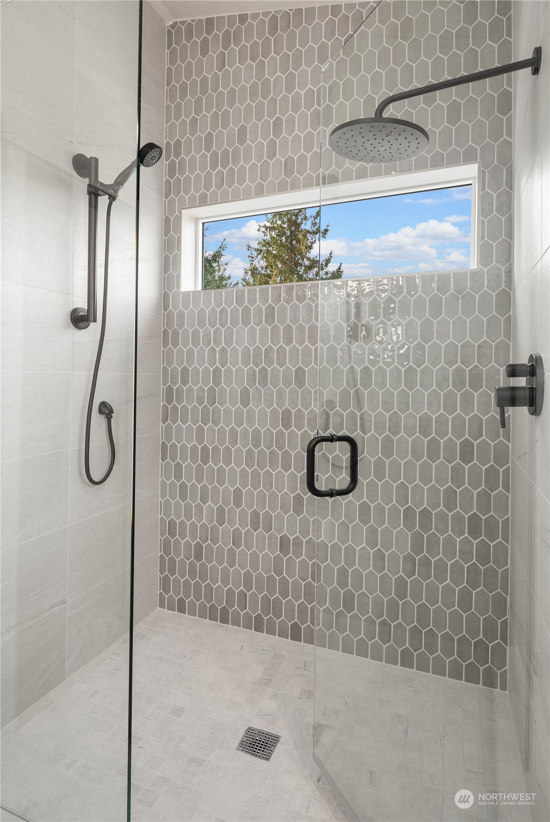 8809 B Wallingford Avenue North Seattle, WA 98103 - Photo 16 of 17 a bathroom with a shower