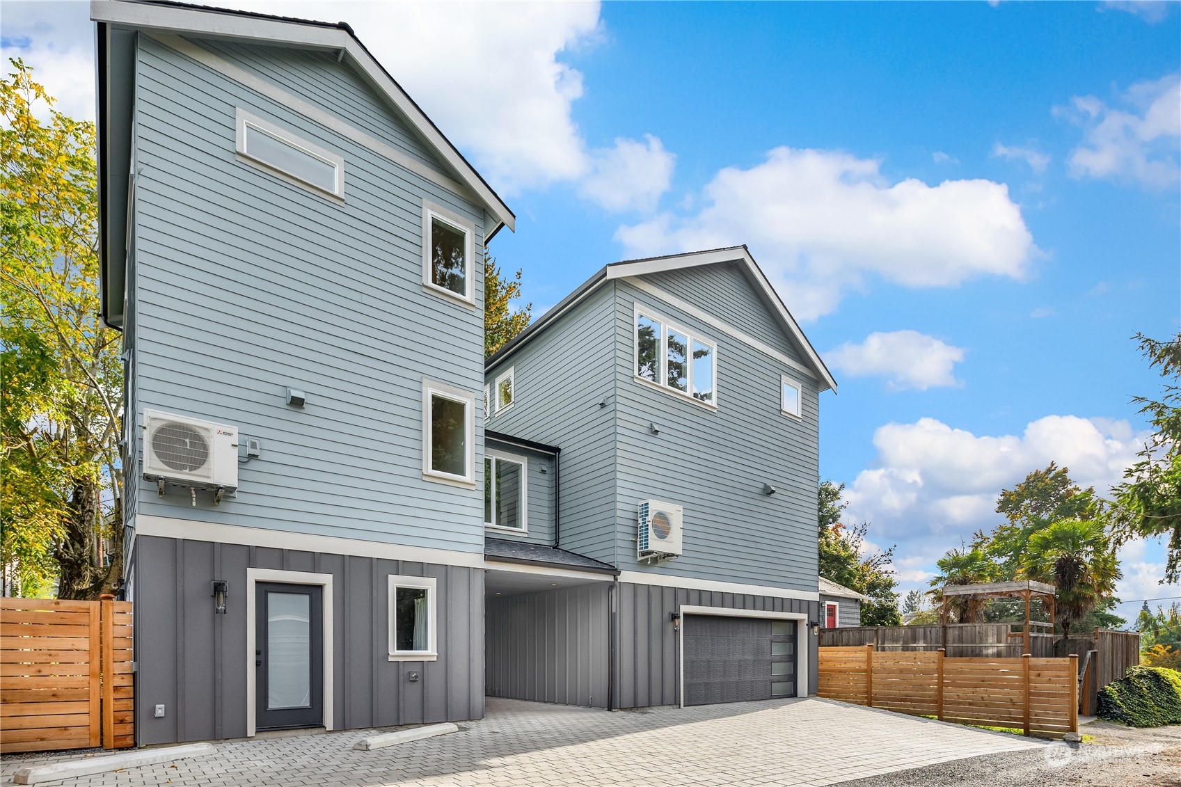 8809 B Wallingford Avenue North Seattle, WA 98103 - Photo 17 of 17 a front view of a house with a garage