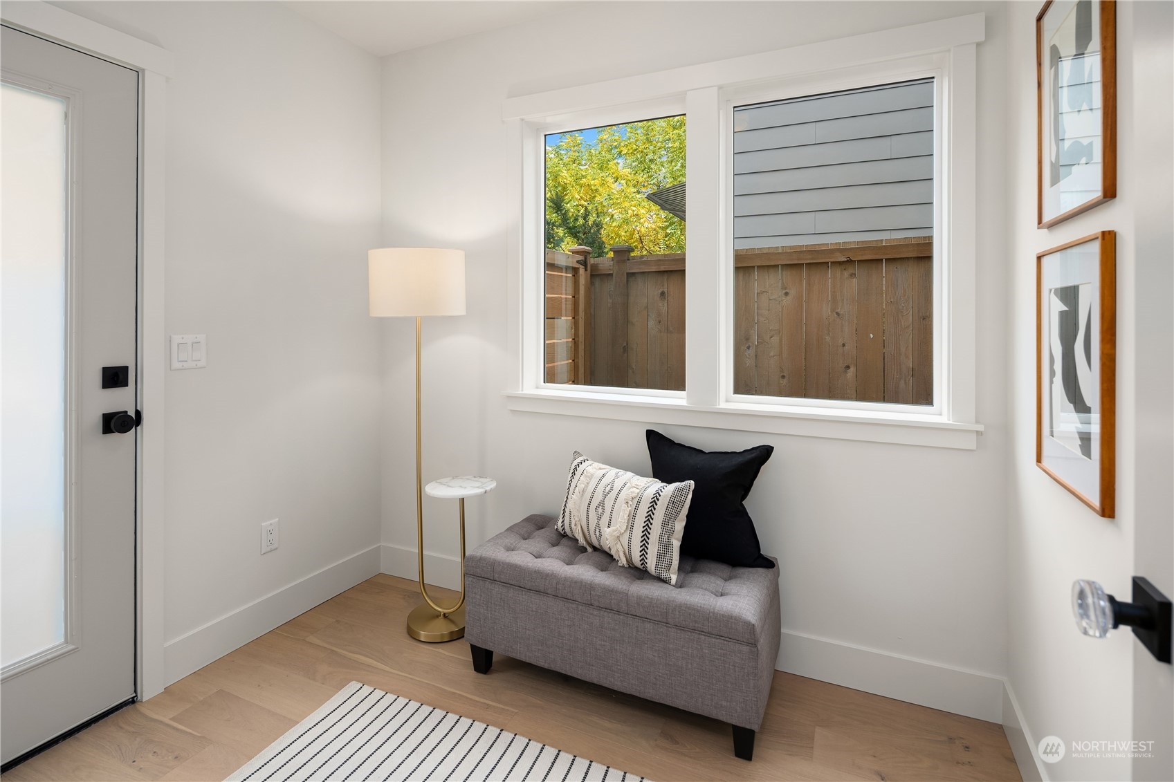 8809 B Wallingford Avenue North Seattle, WA 98103 - Photo 6 of 17 a living room with furniture and a window