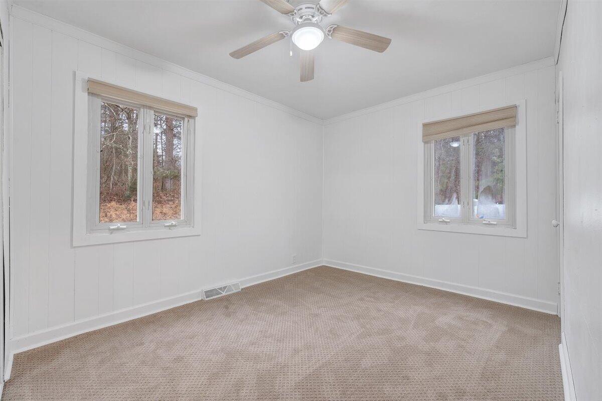 1115 Morgans Mill Road Goodview, VA 24095 - Photo 12 of 50 a view of an empty room with a window