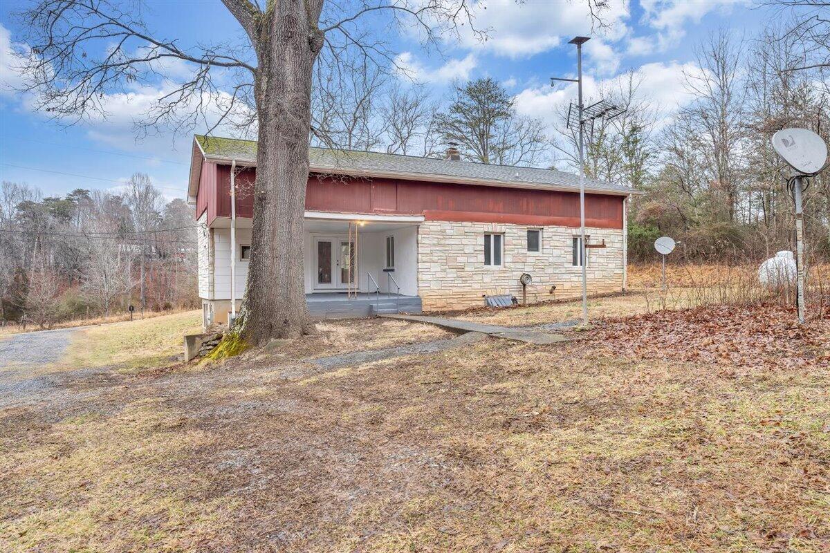 1115 Morgans Mill Road Goodview, VA 24095 - Photo 46 of 50 a view of back yard of the house