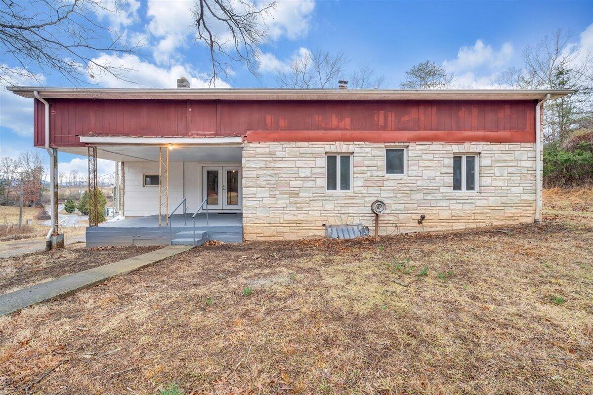 1115 Morgans Mill Road Goodview, VA 24095 - Photo 47 of 50 a front view of a house with a yard