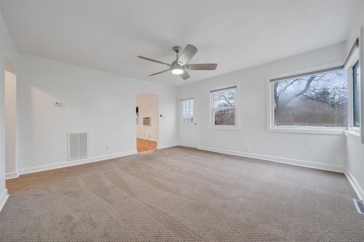 1115 Morgans Mill Road Goodview, VA 24095 - Photo 10 of 50 a view of an empty room with a window
