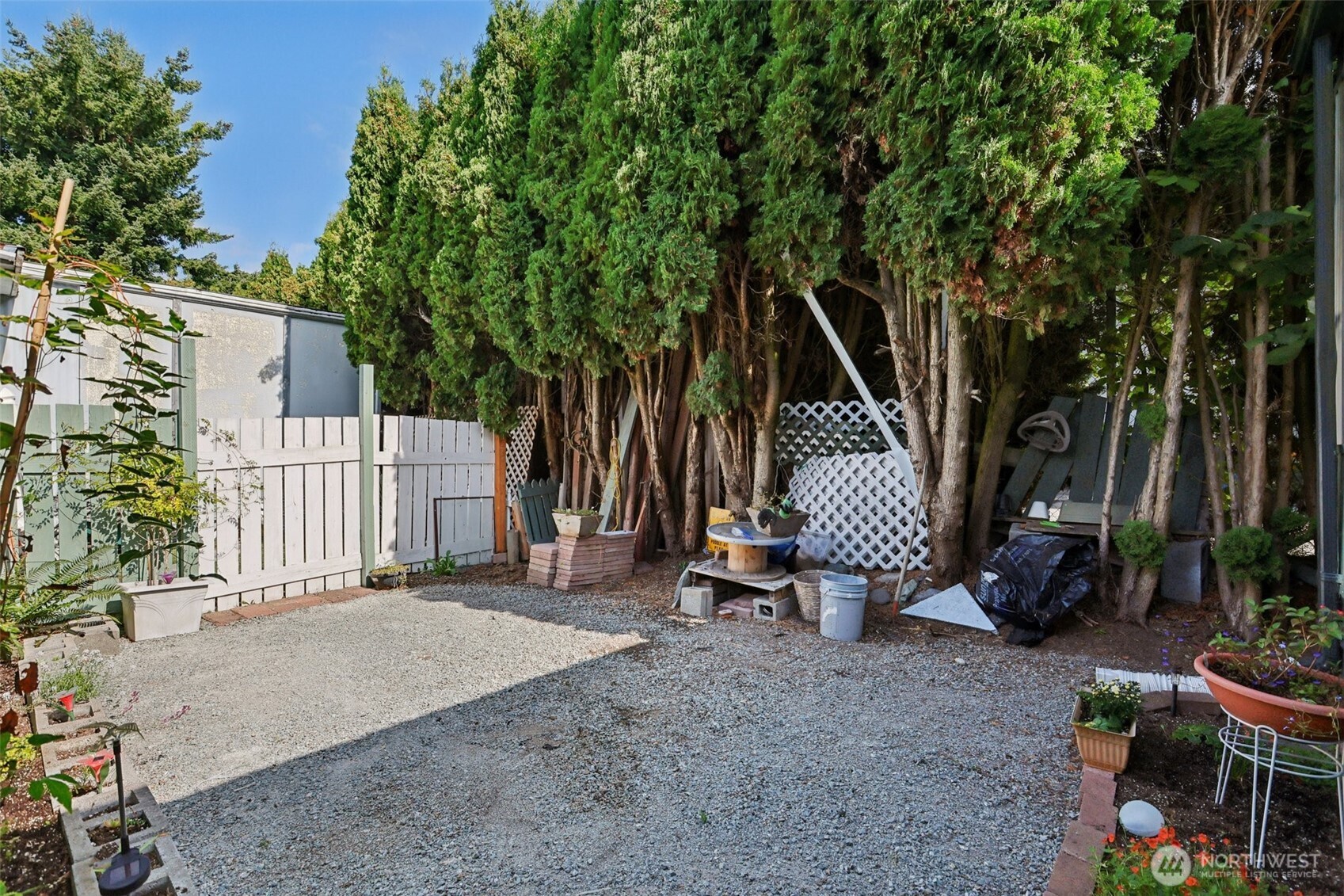 2522 Old Highway 99 South Road, Unit 19 Mount Vernon, WA 98273 - Photo 20 of 21 a view of a chair and table in the backyard