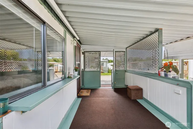 a view of a porch with furniture