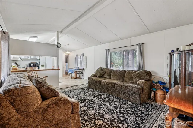 a living room with furniture and a couch