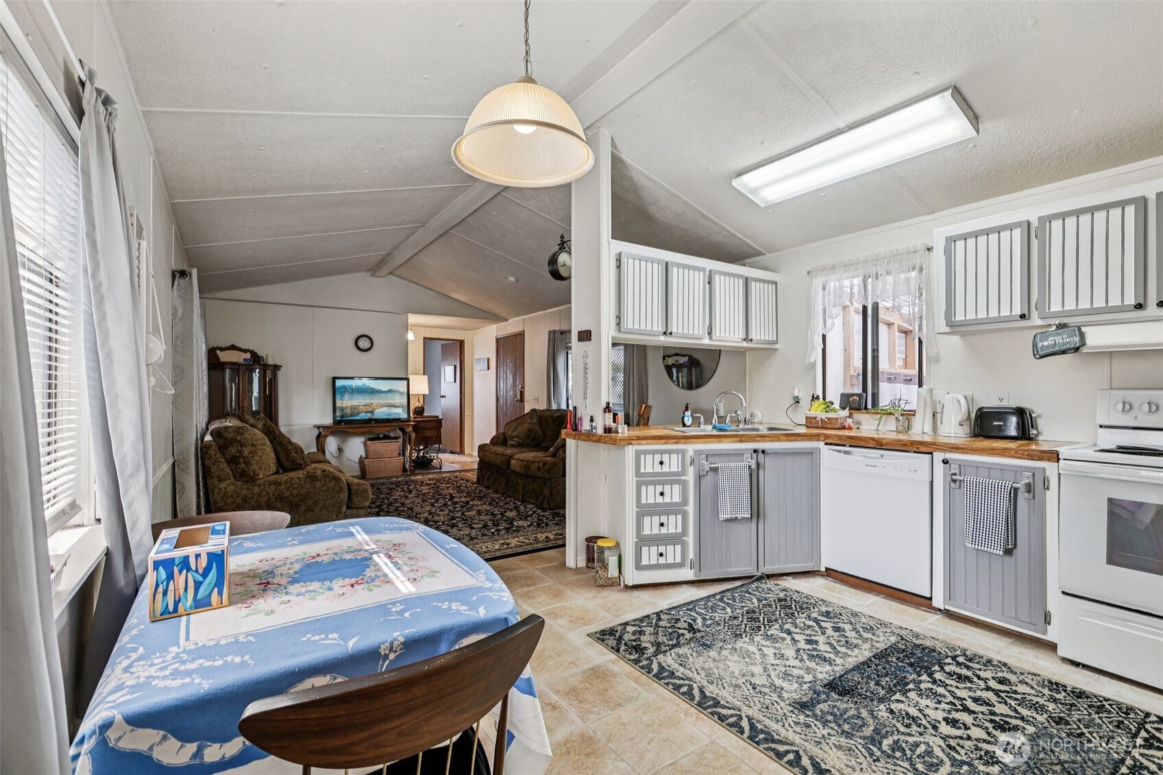 2522 Old Highway 99 South Road, Unit 19 Mount Vernon, WA 98273 - Photo 9 of 21 a kitchen with sink refrigerator and stove
