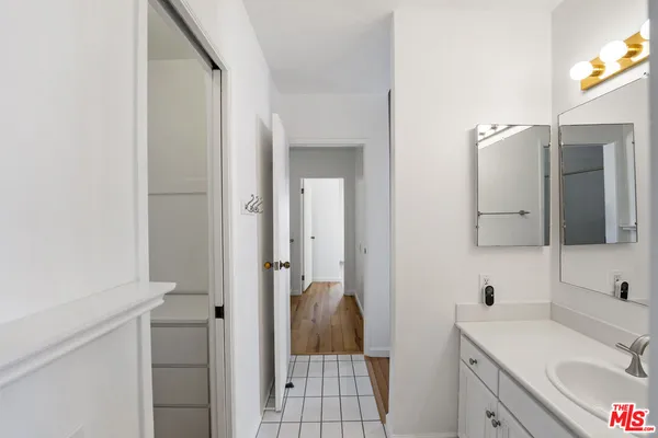 a view of a kitchen with appliances and cabinets