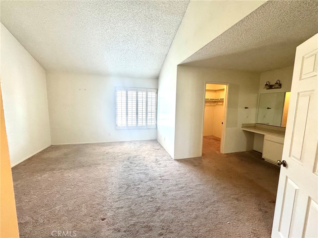 8939 Gallatin Road, Unit 16 Pico Rivera, CA 90660 - Photo 13 of 17 MASTER BED