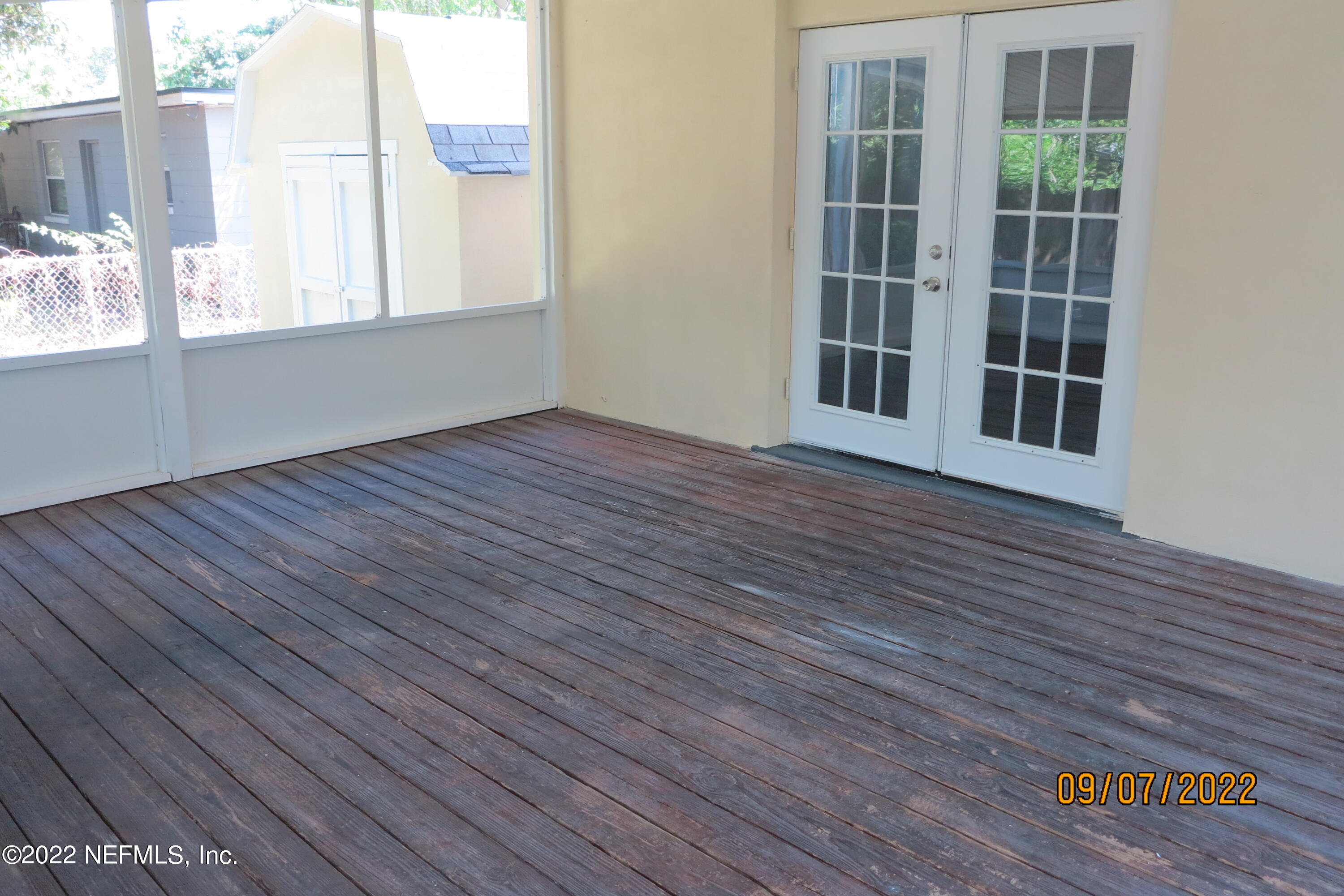 2448 Sam Road Jacksonville, FL 32216 - Photo 34 of 43 Screened in Porch View 1