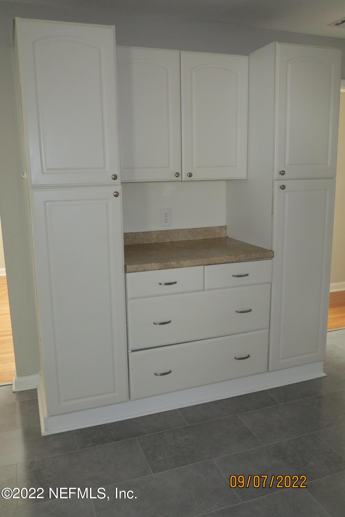 2448 Sam Road Jacksonville, FL 32216 - Photo 9 of 43 Pantry Cabinet in Kitchen