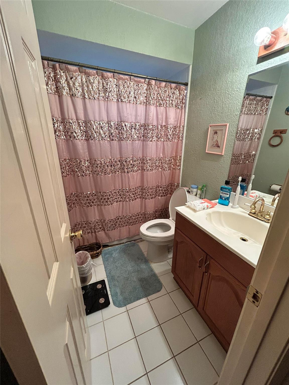 6069 Camp Lee Road West Palm Beach, FL 33417 - Photo 7 of 9 a bathroom with a sink toilet and shower