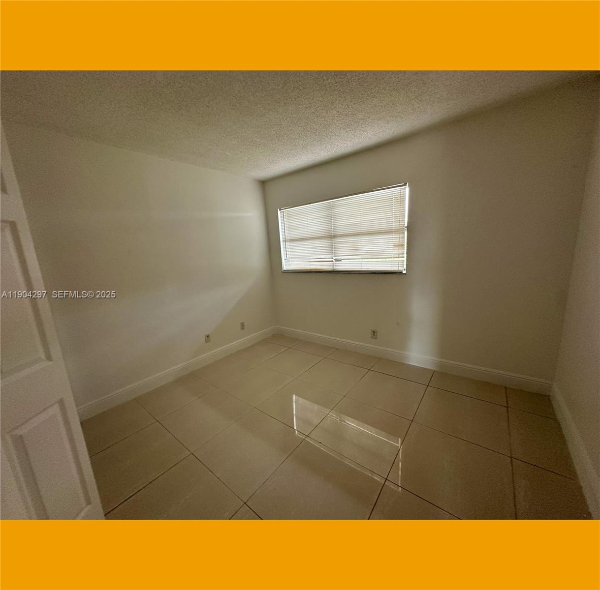 3396 Foxcroft Road, Unit 305 Miramar, FL 33025 - Photo 12 of 20 a open area with cabinets